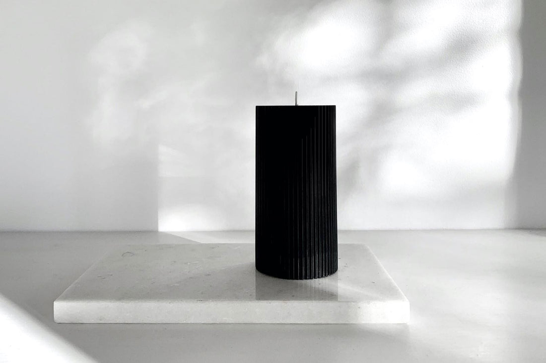 Black pillar candle