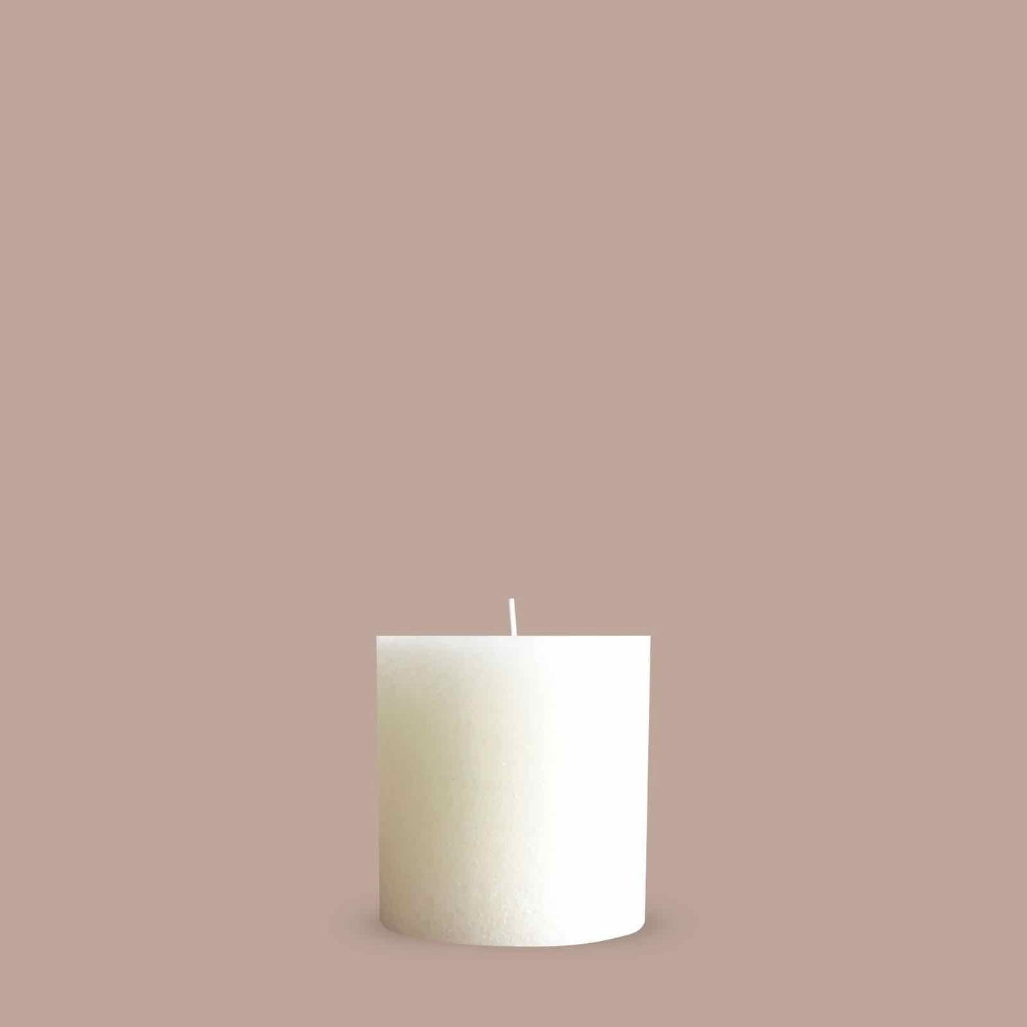 Wide textured pillar candle