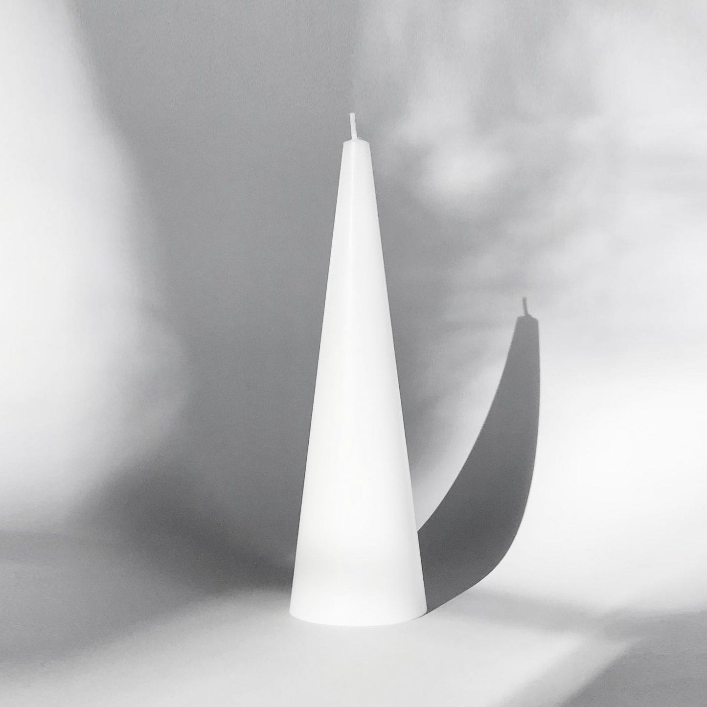 Pure white cone candle