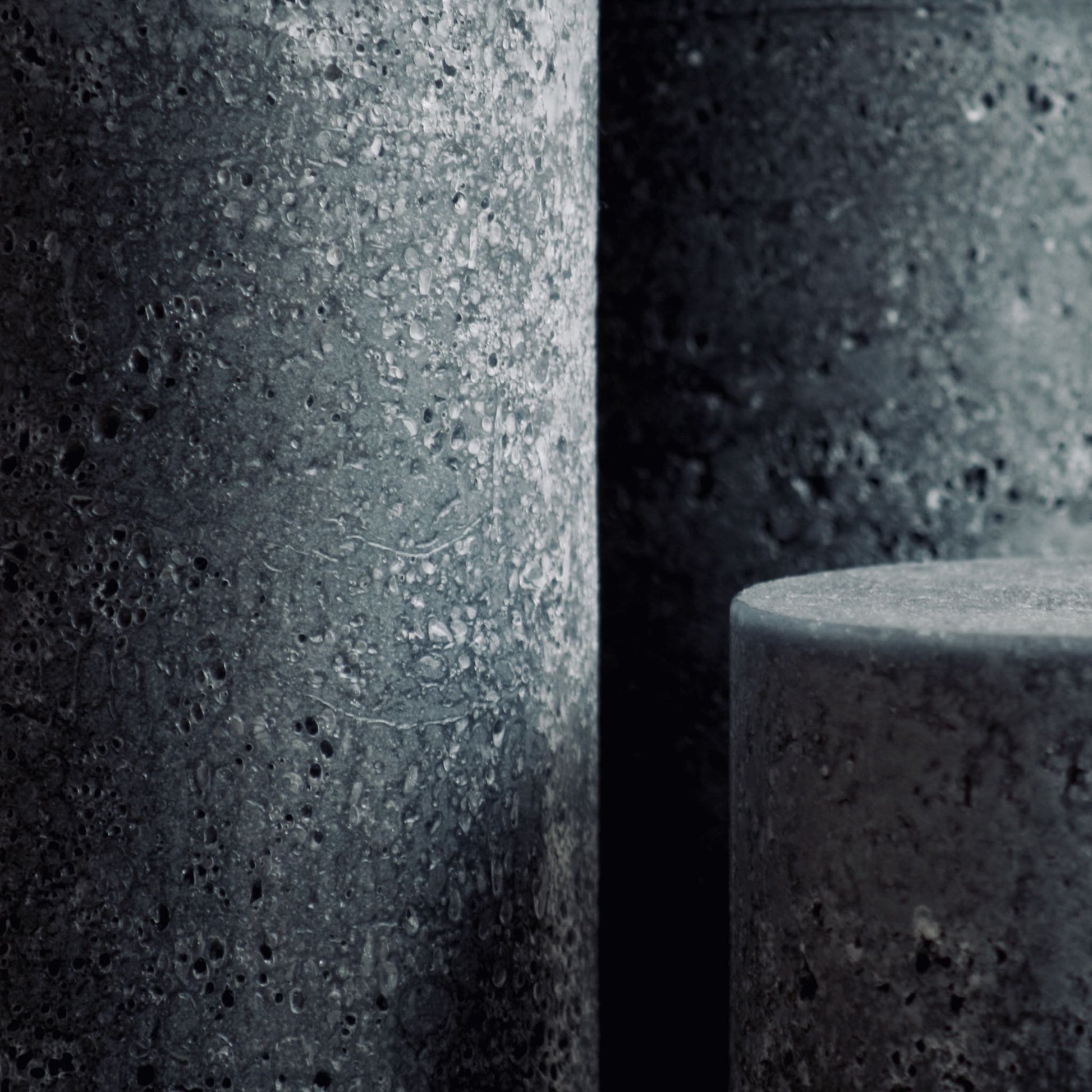 Large rustic textured candles in charcoal