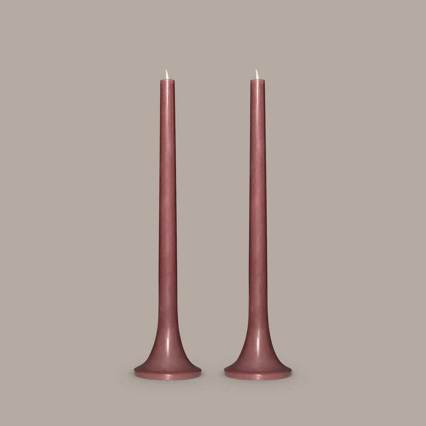 Tall taper candles in neutral brown