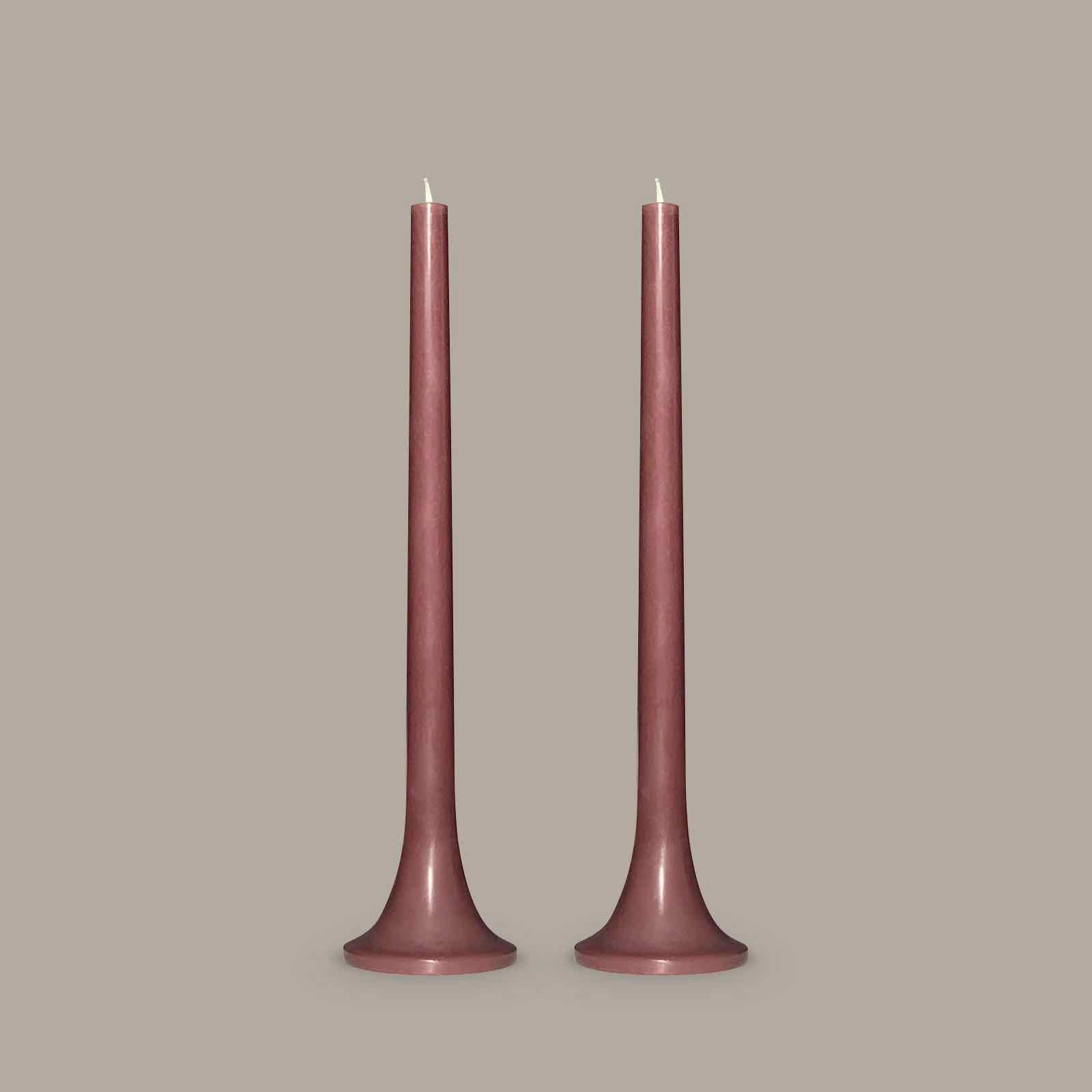 Tall taper candles in neutral brown