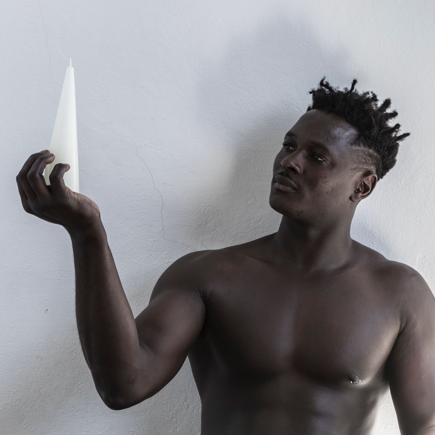 Tall white cone candle
