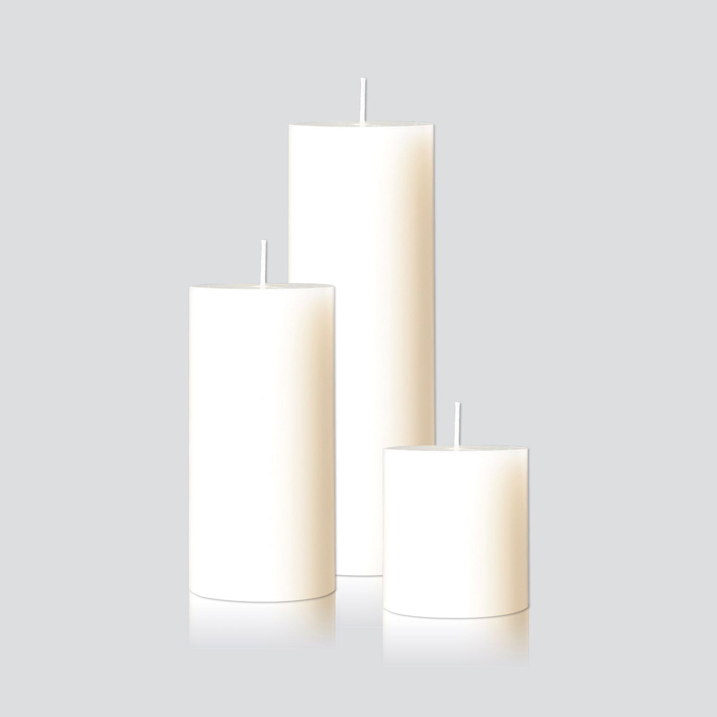 Large white pillar candles