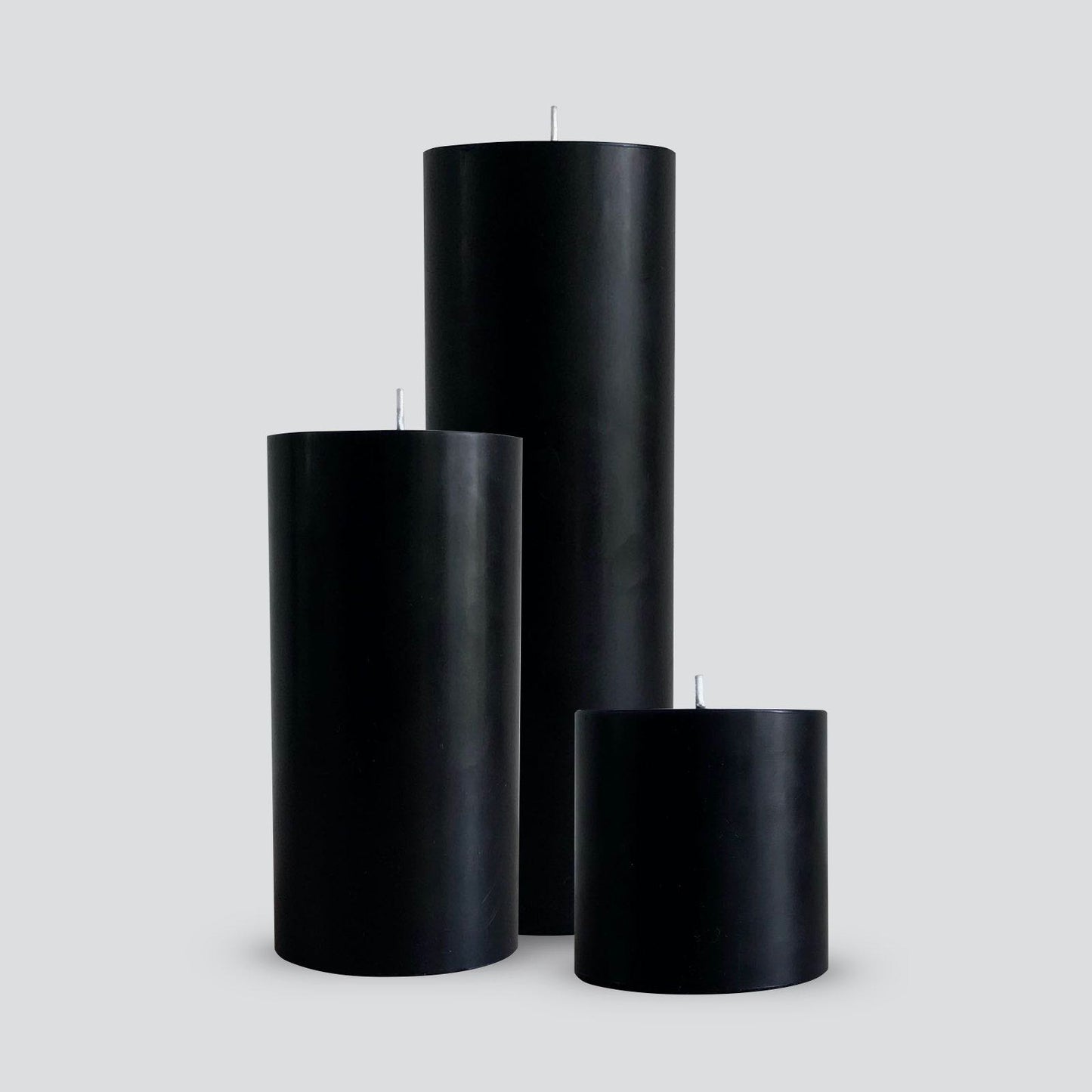 Large black pillar candles