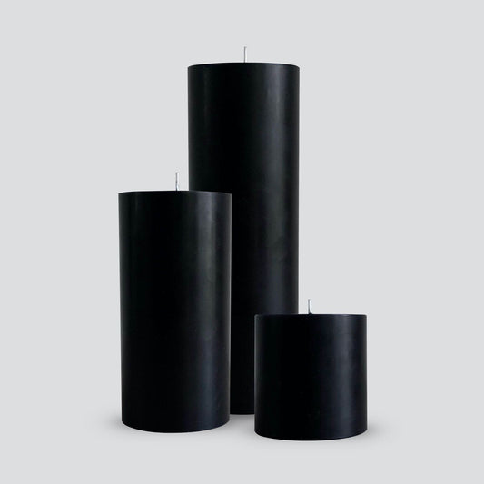 Large black pillar candles