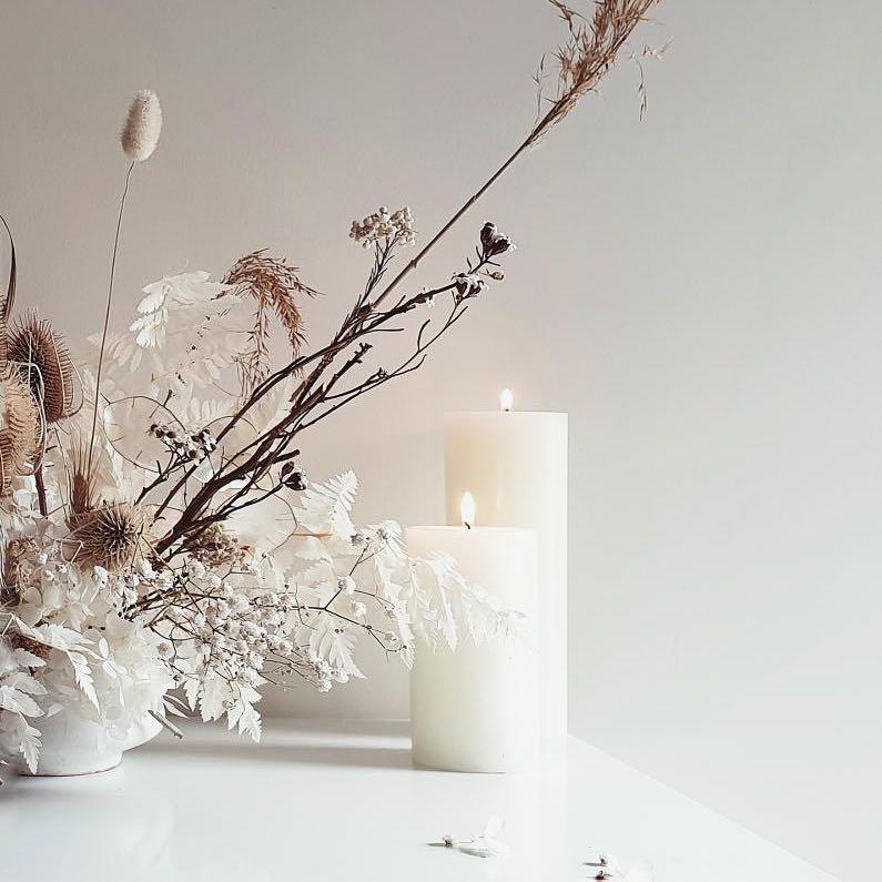 Large white pillar candles