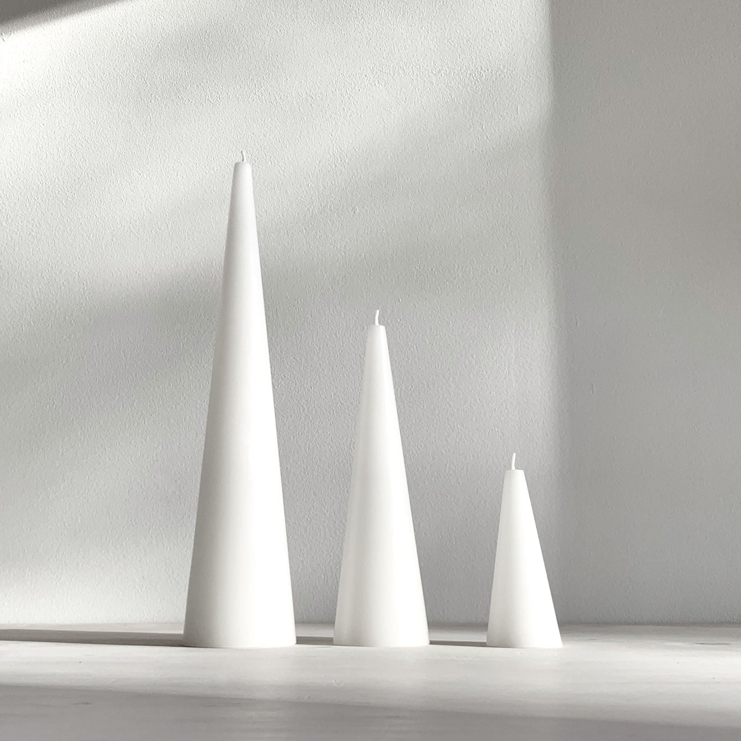 White cone commemorative candles