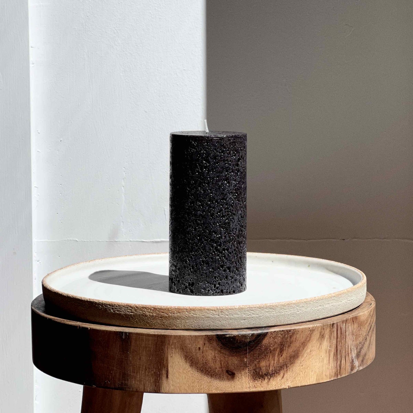 Rustic black pillar candle
