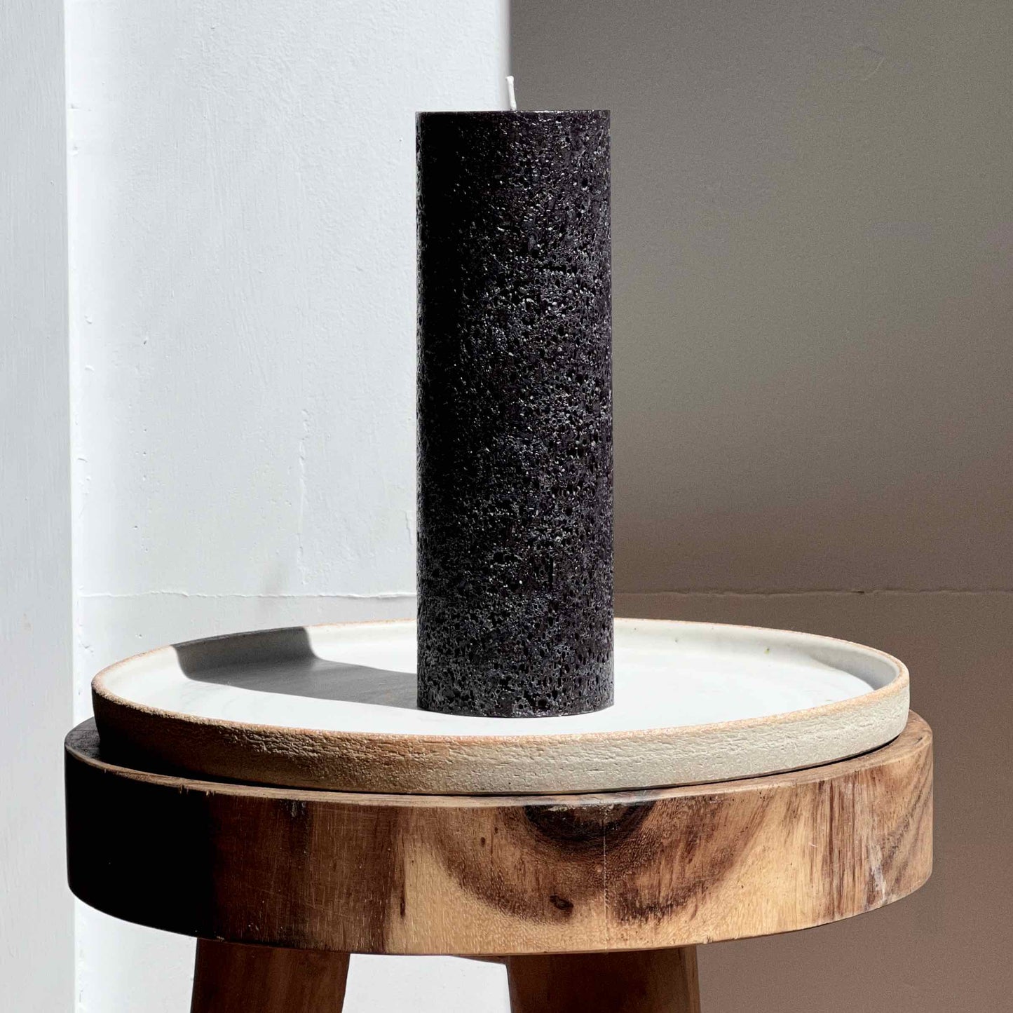 Rustic black pillar candle