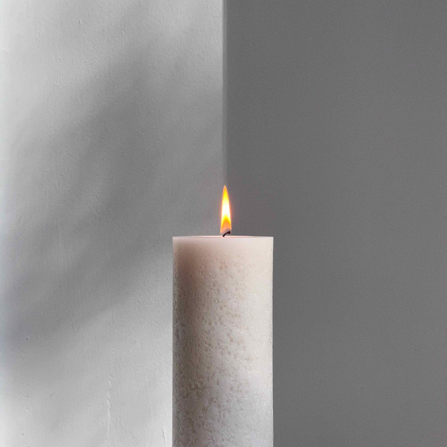 Beige pillar candle