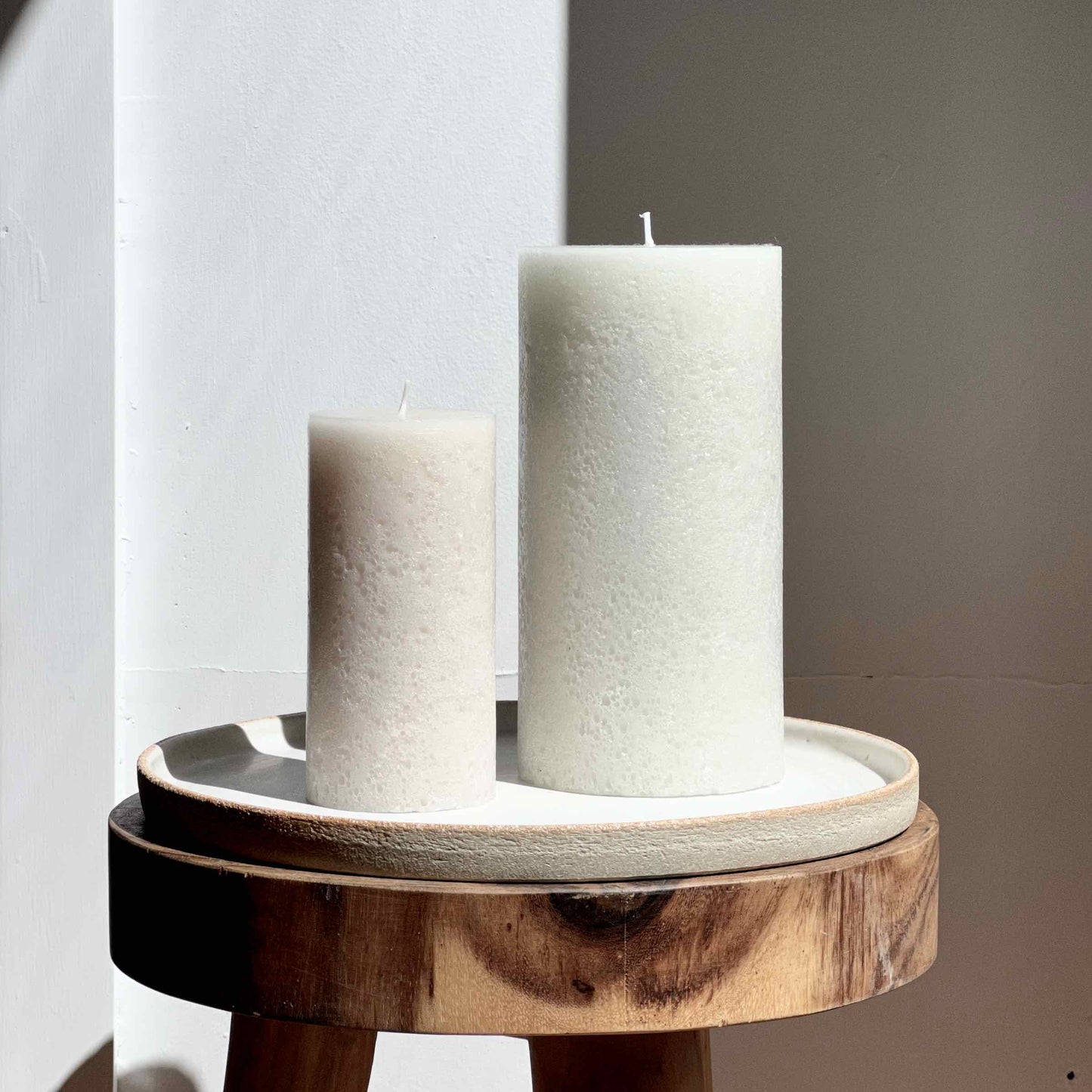 Neutral rustic pillar candles