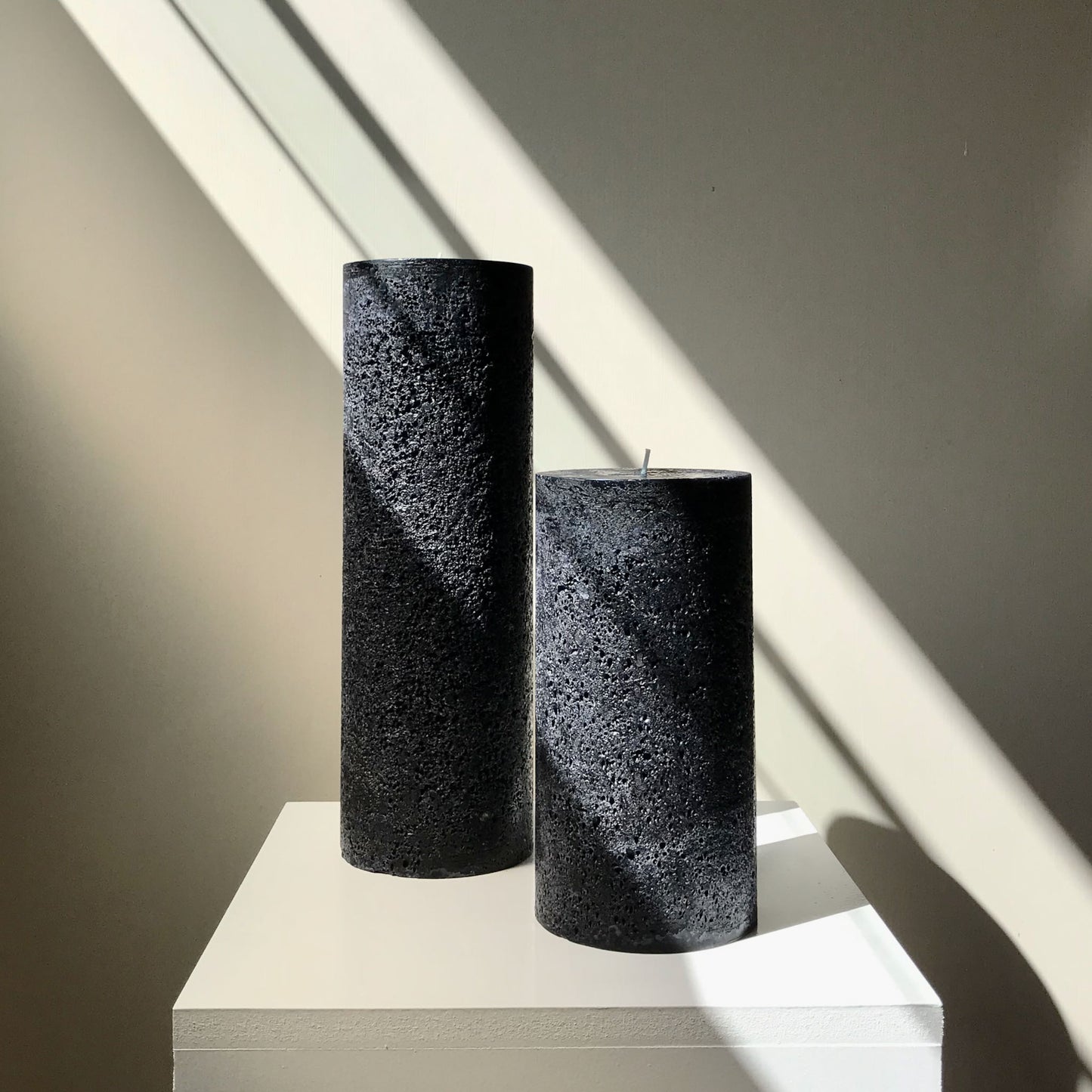 Black textured pillar candles