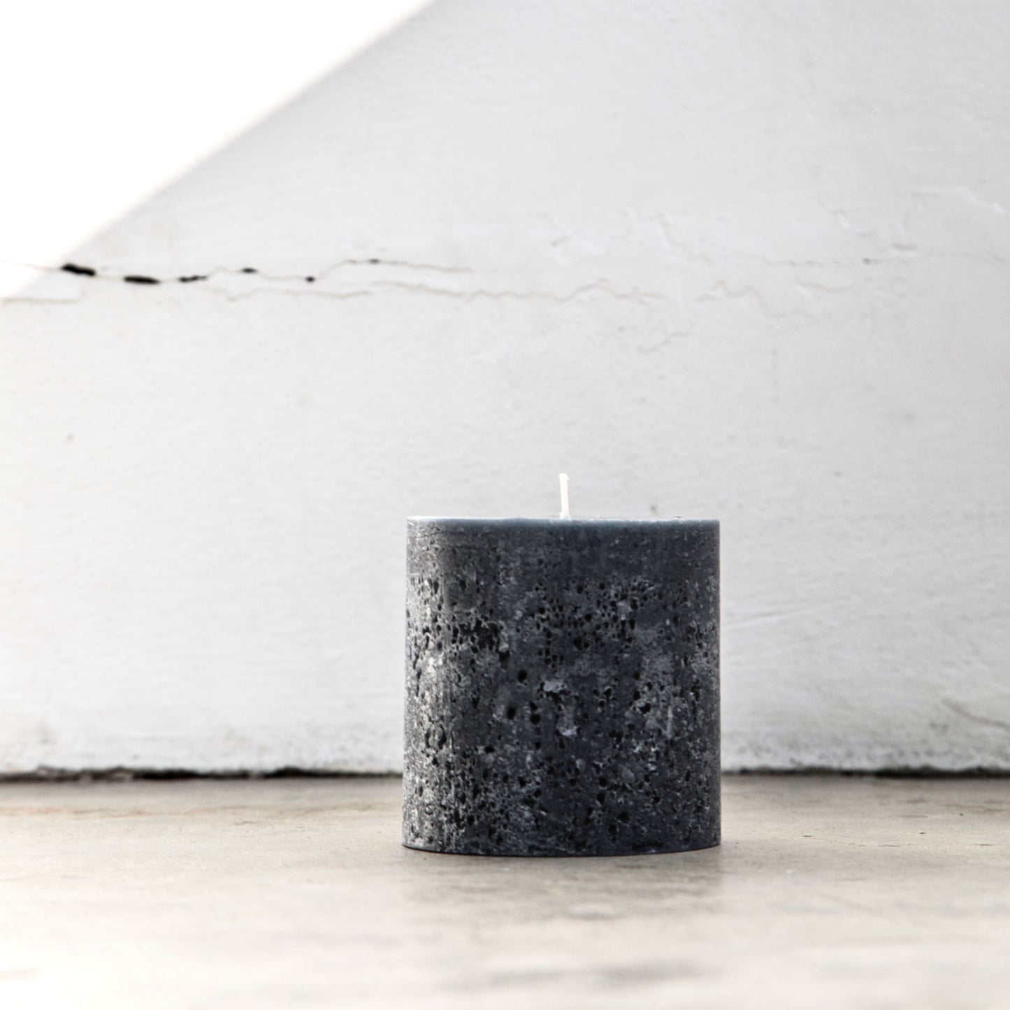 Rustic grey pillar candle