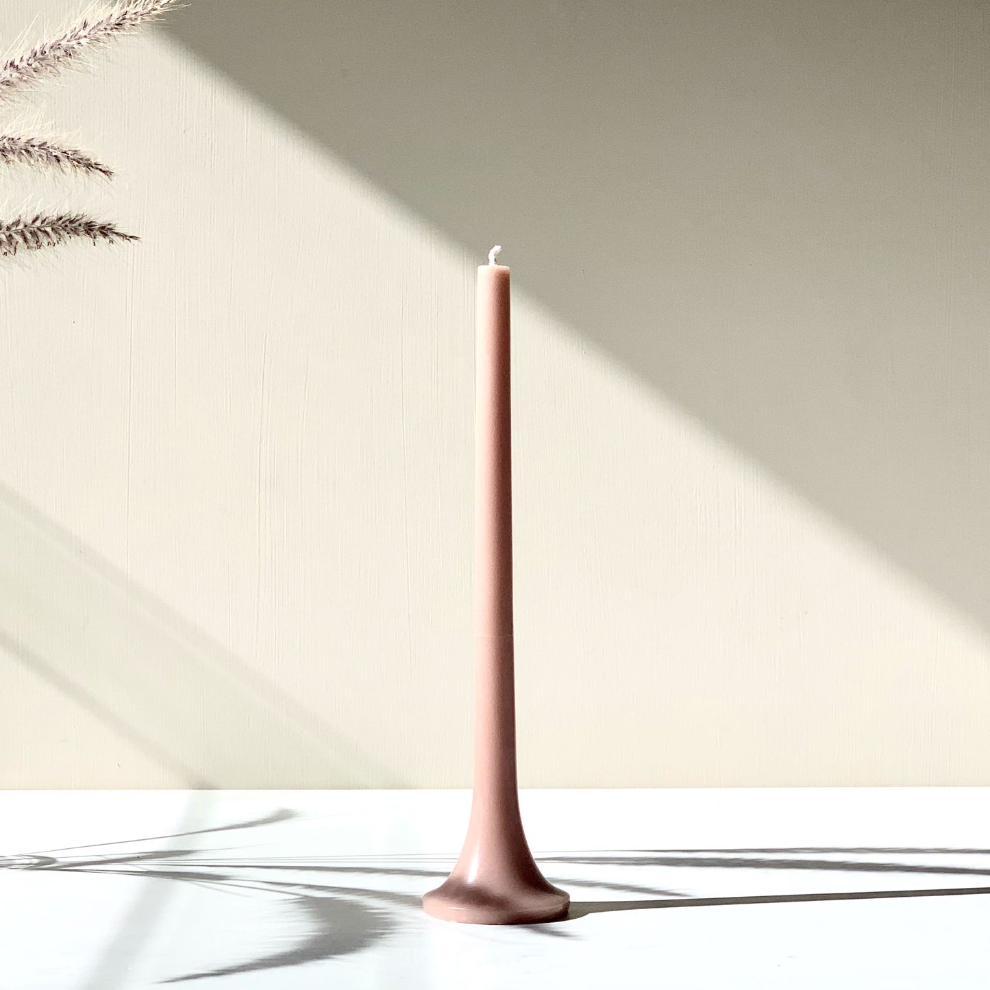 Elegant clay taper candle