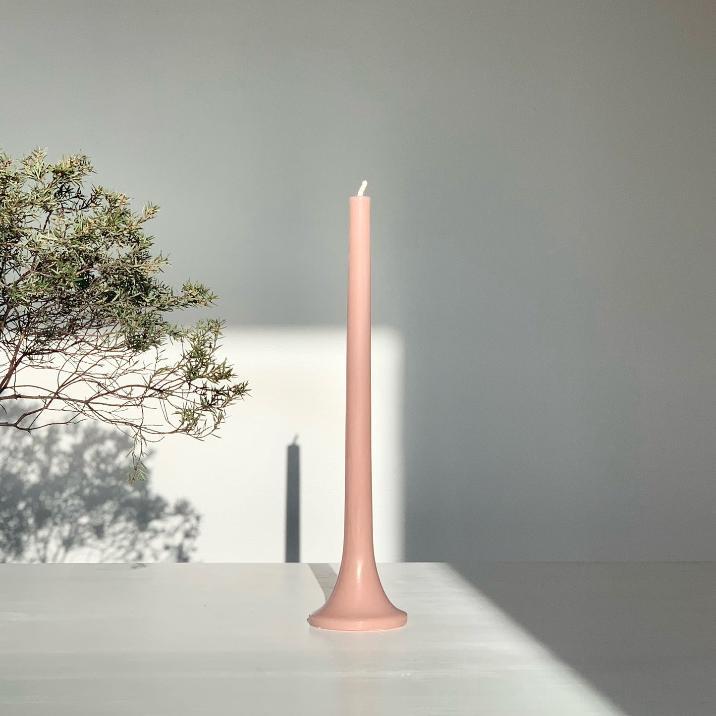 Light brown taper candle