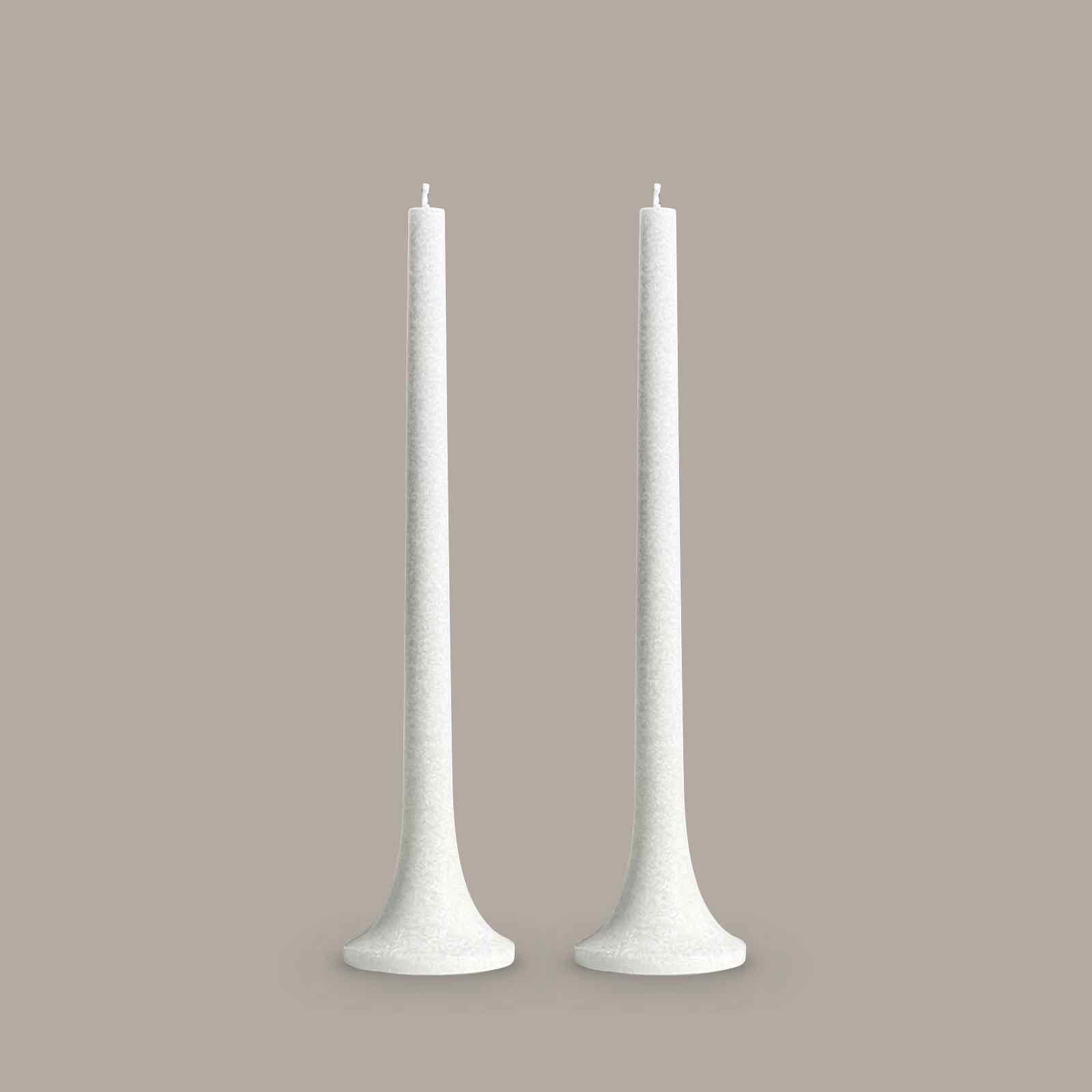 Elegant tall taper candles in nordic white