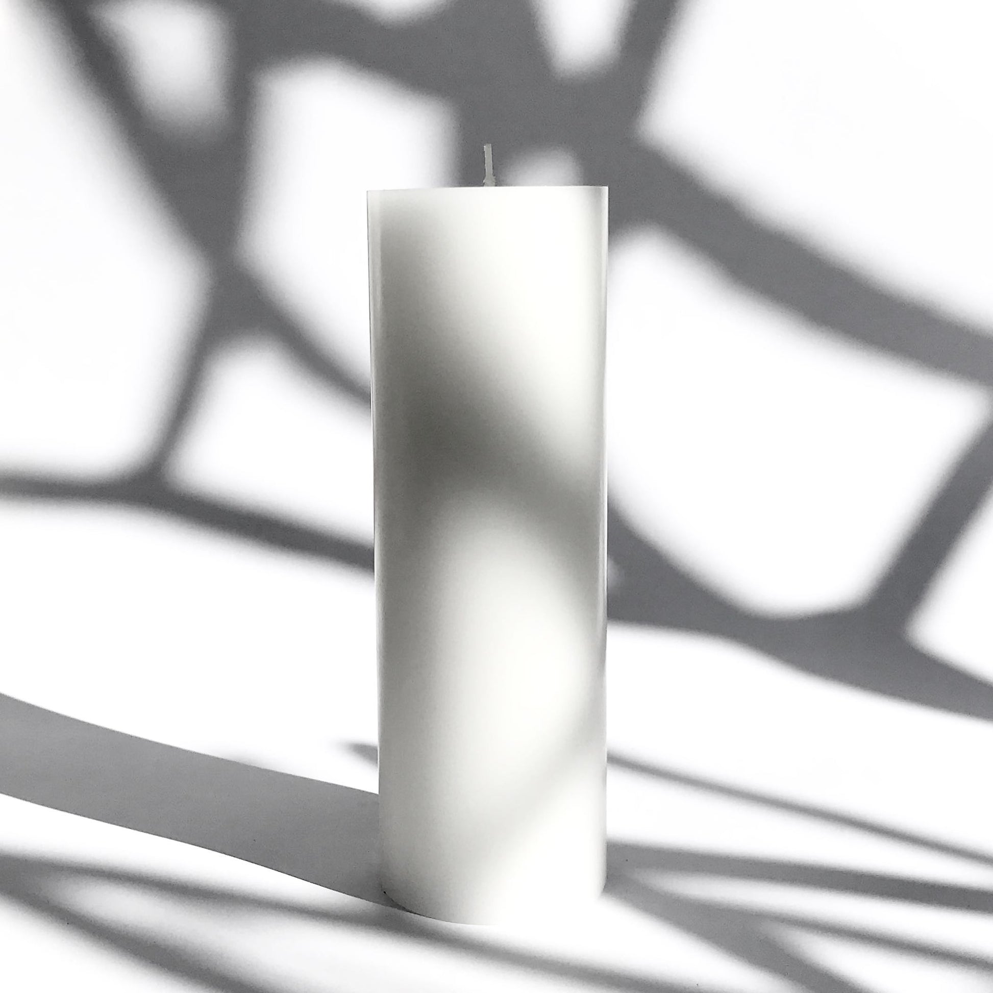 Large white pillar candle