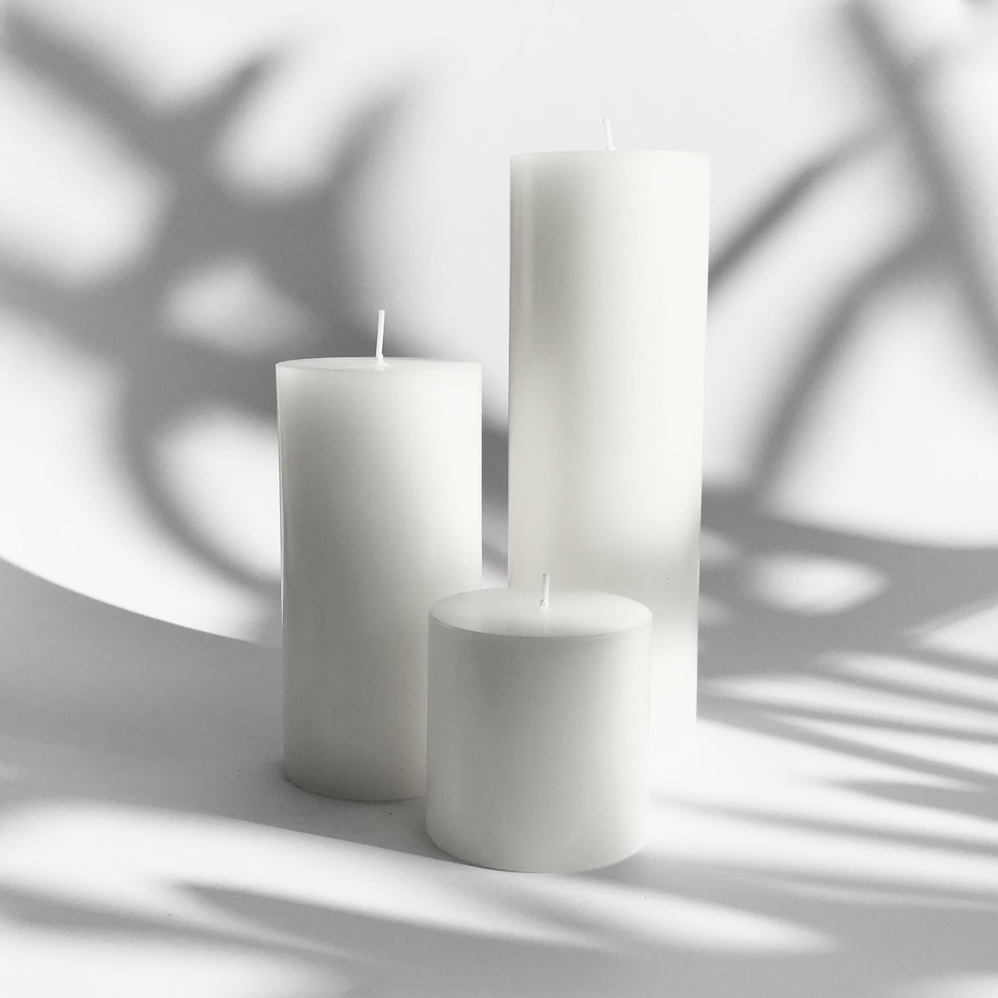 Large white pillar candles