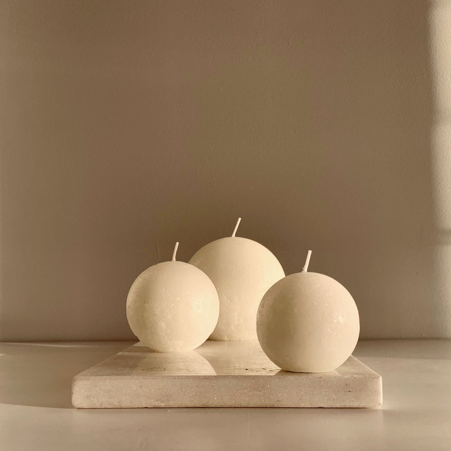 Textured white ball candles