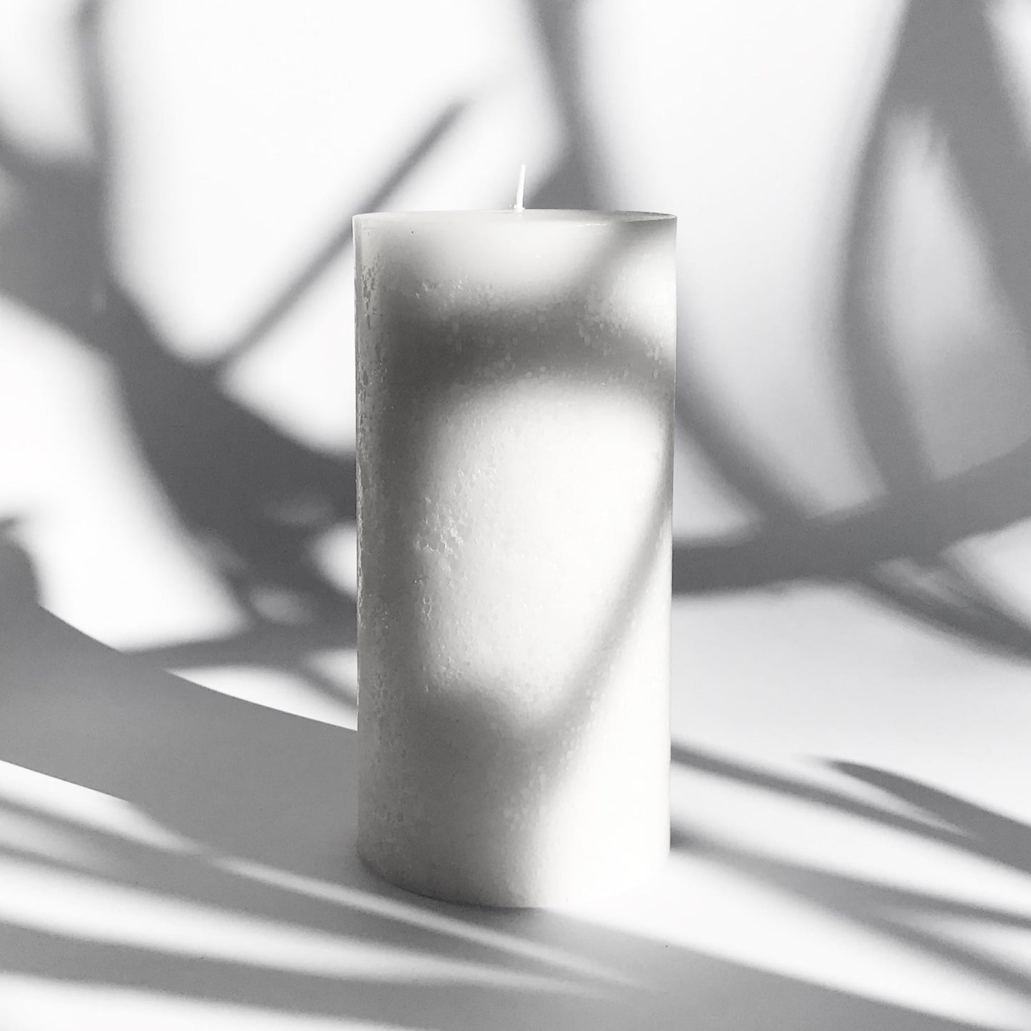 Rustic white pillar candle