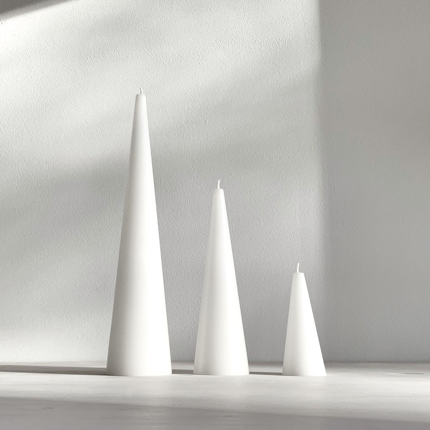 White sculptural candles