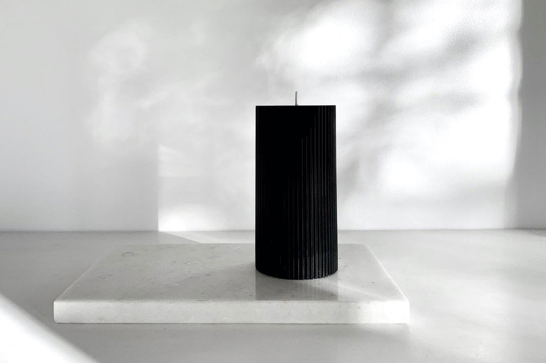 Black pillar candle