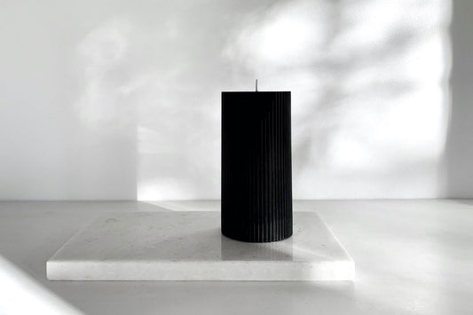 Black pillar candle