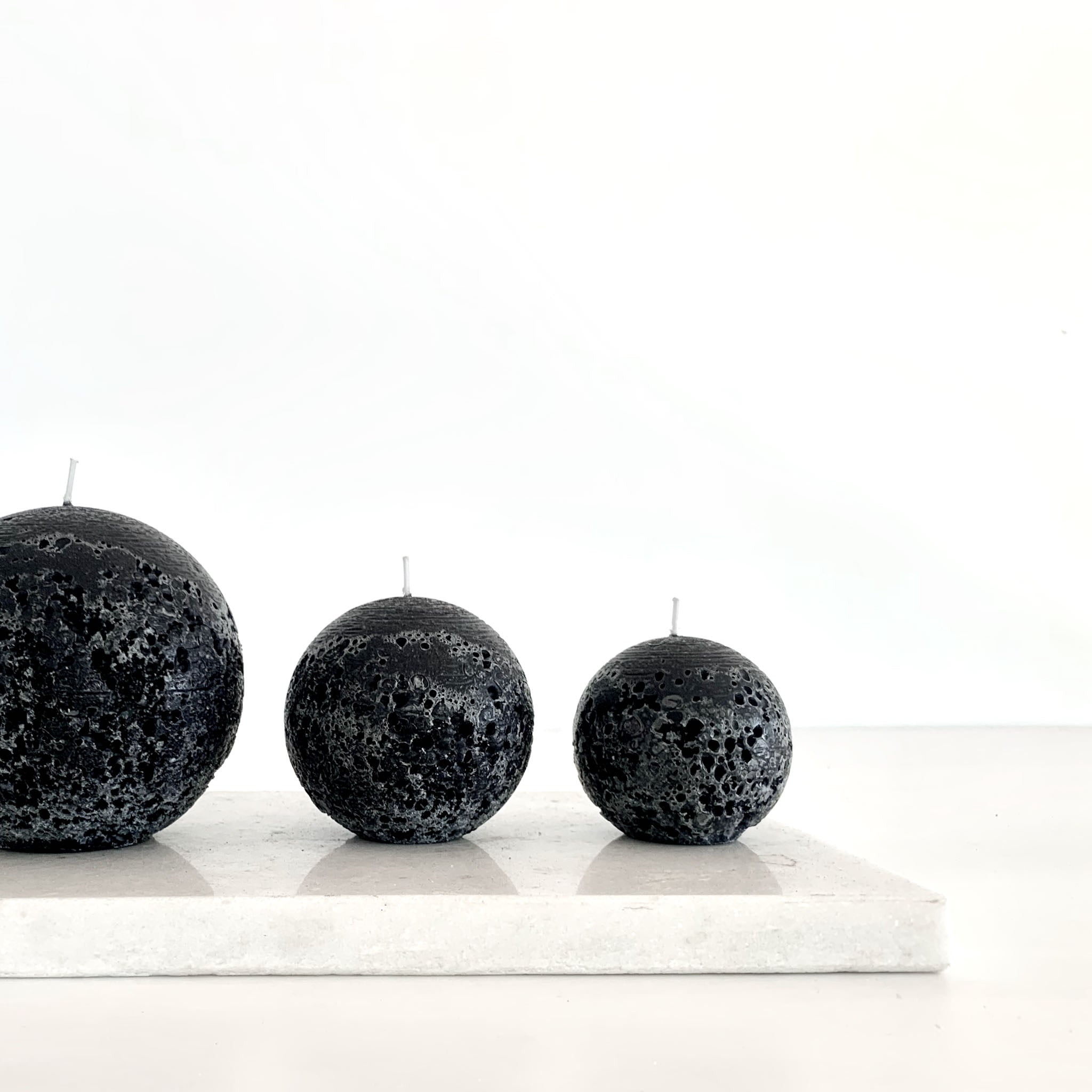 Black sphere candles