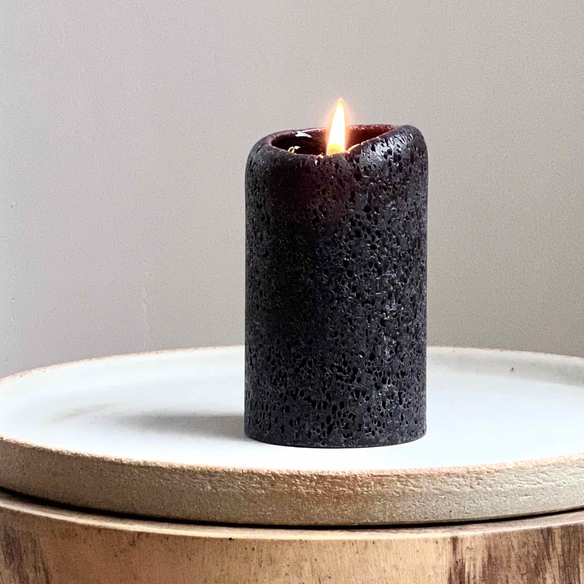 Textured black pillar candle