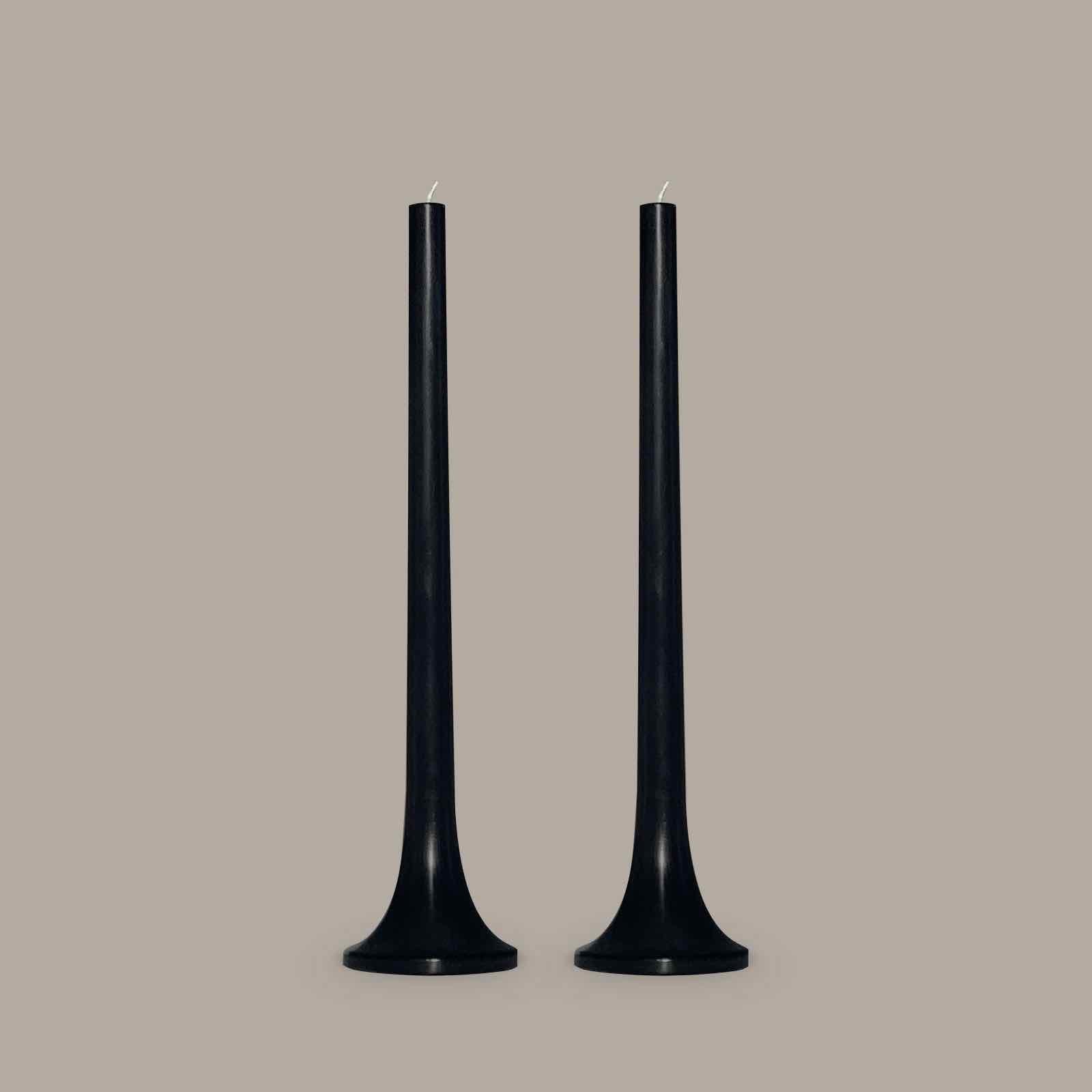 Tall black taper candle