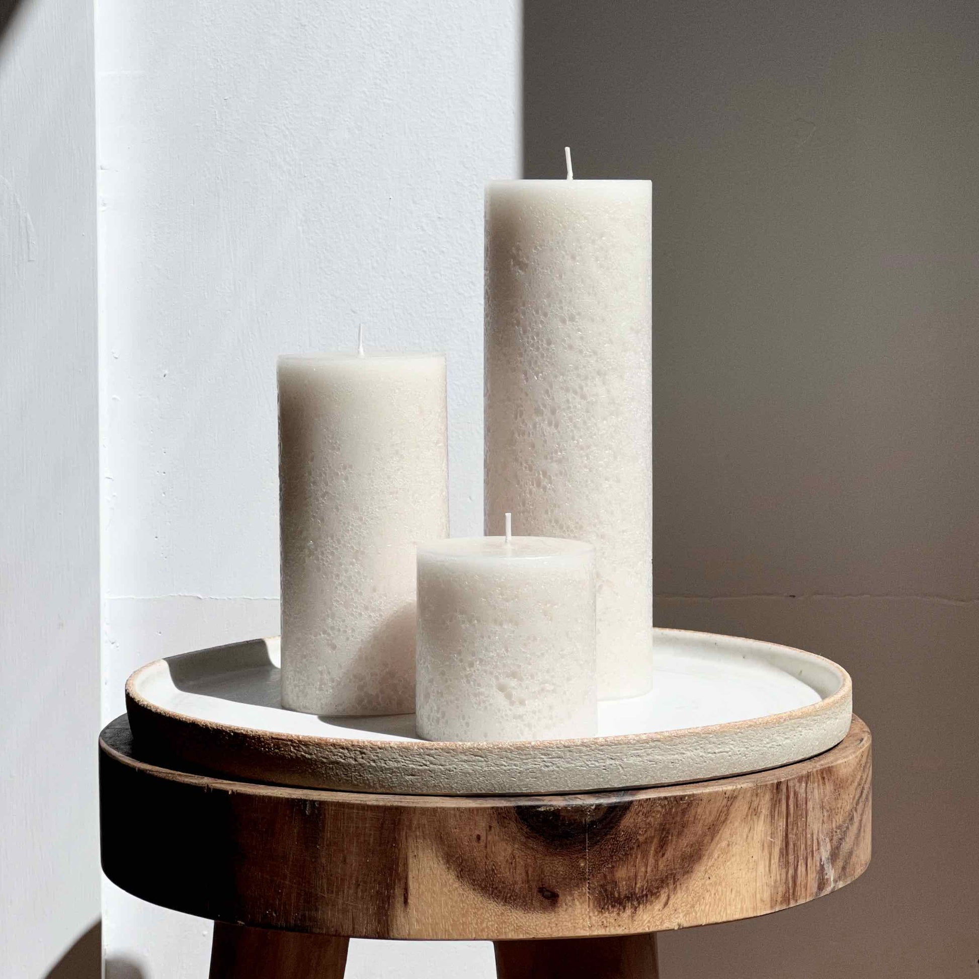 Textured ivory pillar candles