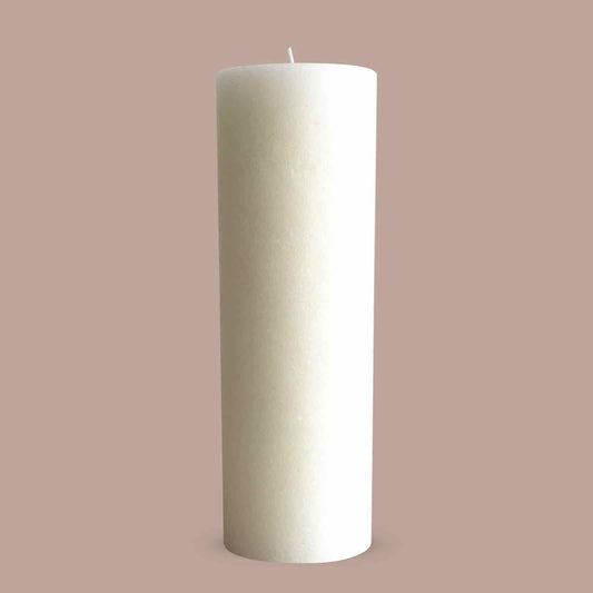 Large warm white textured pillar candle