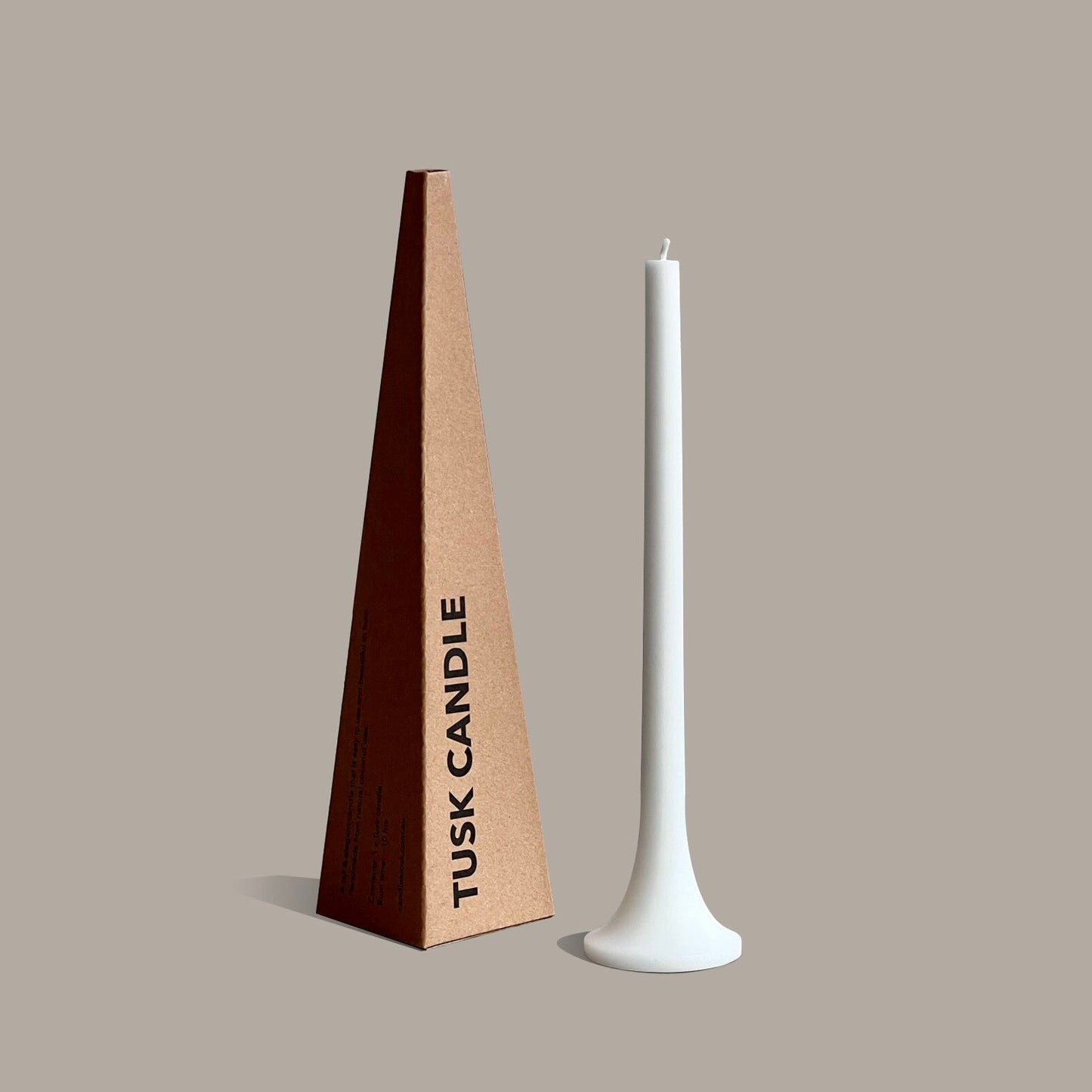 Tall white taper candle