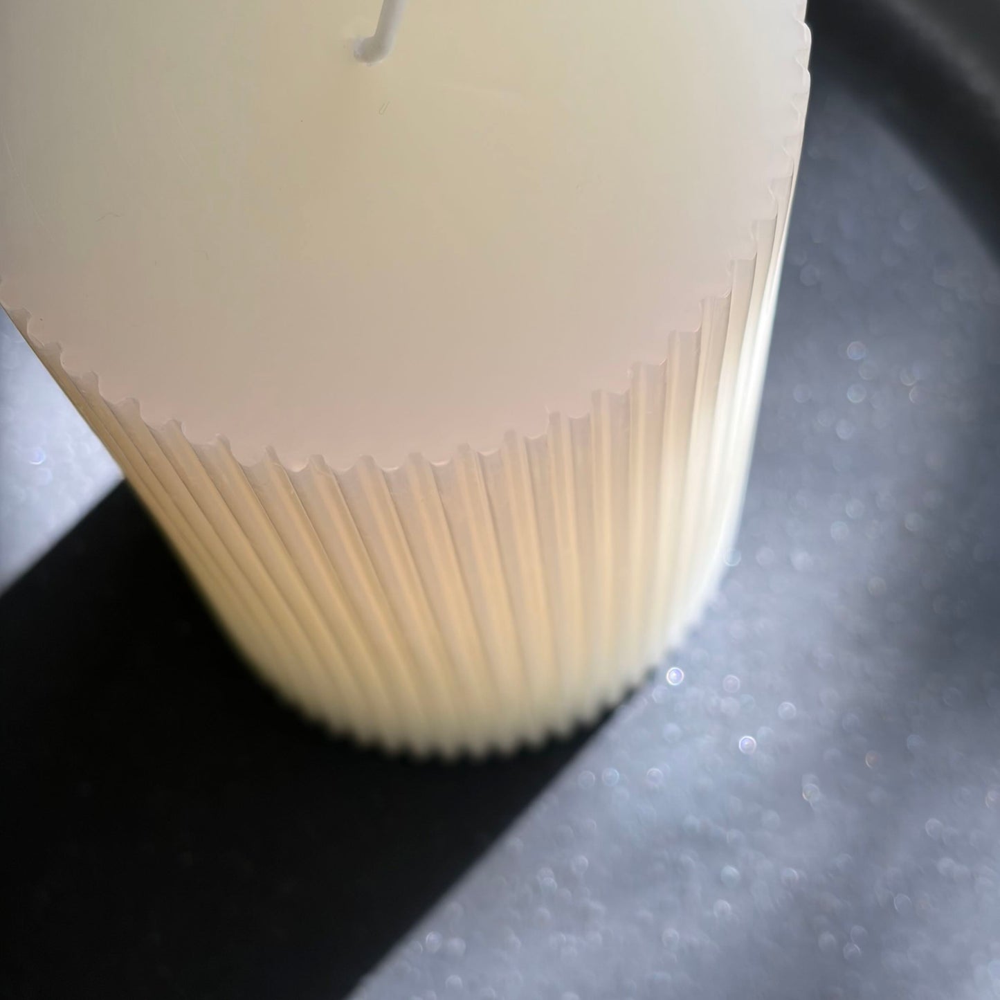 Ribbed white pillar candle
