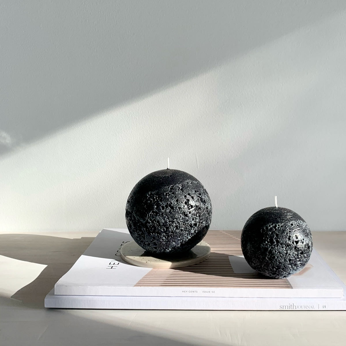Black spherical candle
