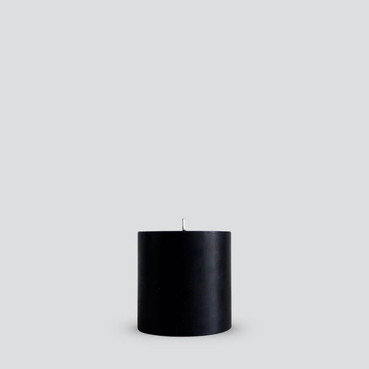 Large black pillar candle