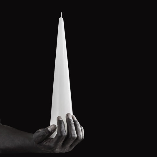 Large white sculptural cone candle