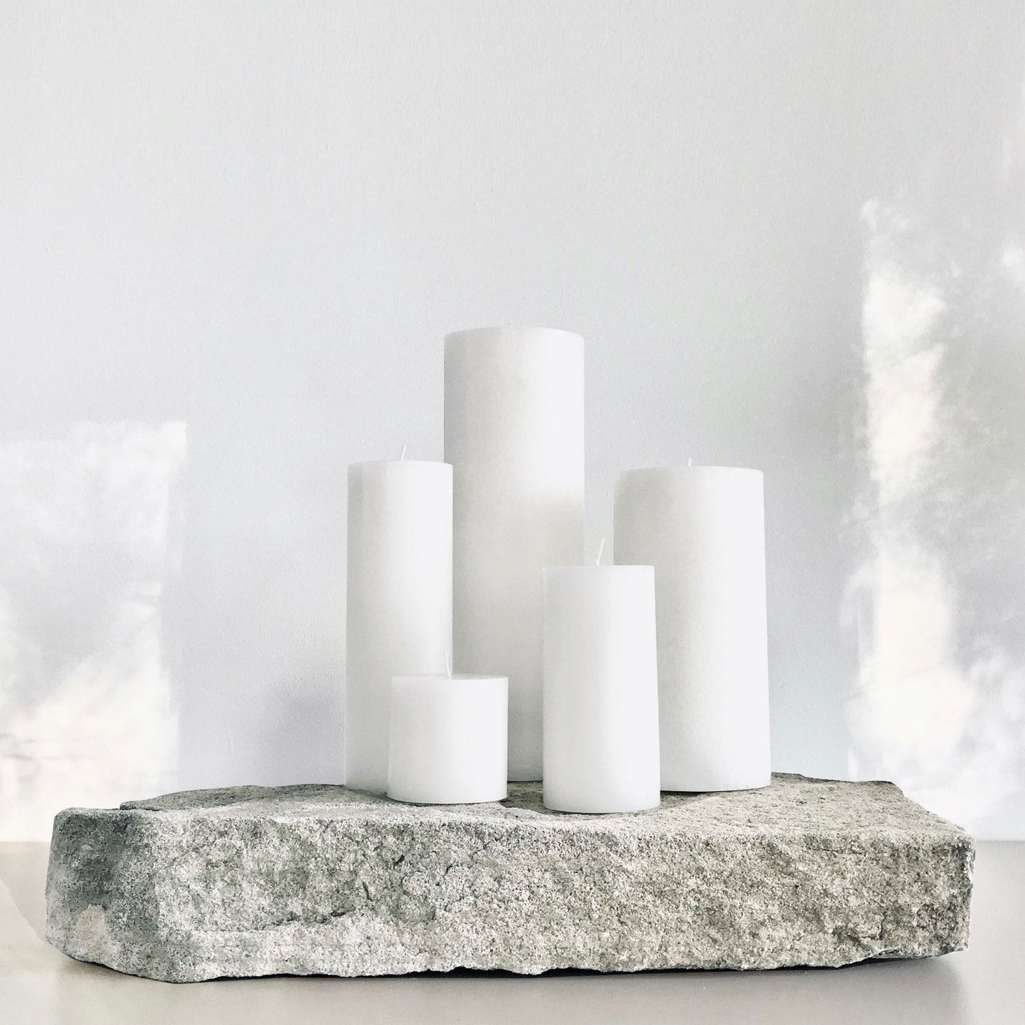 Large white pillar candles