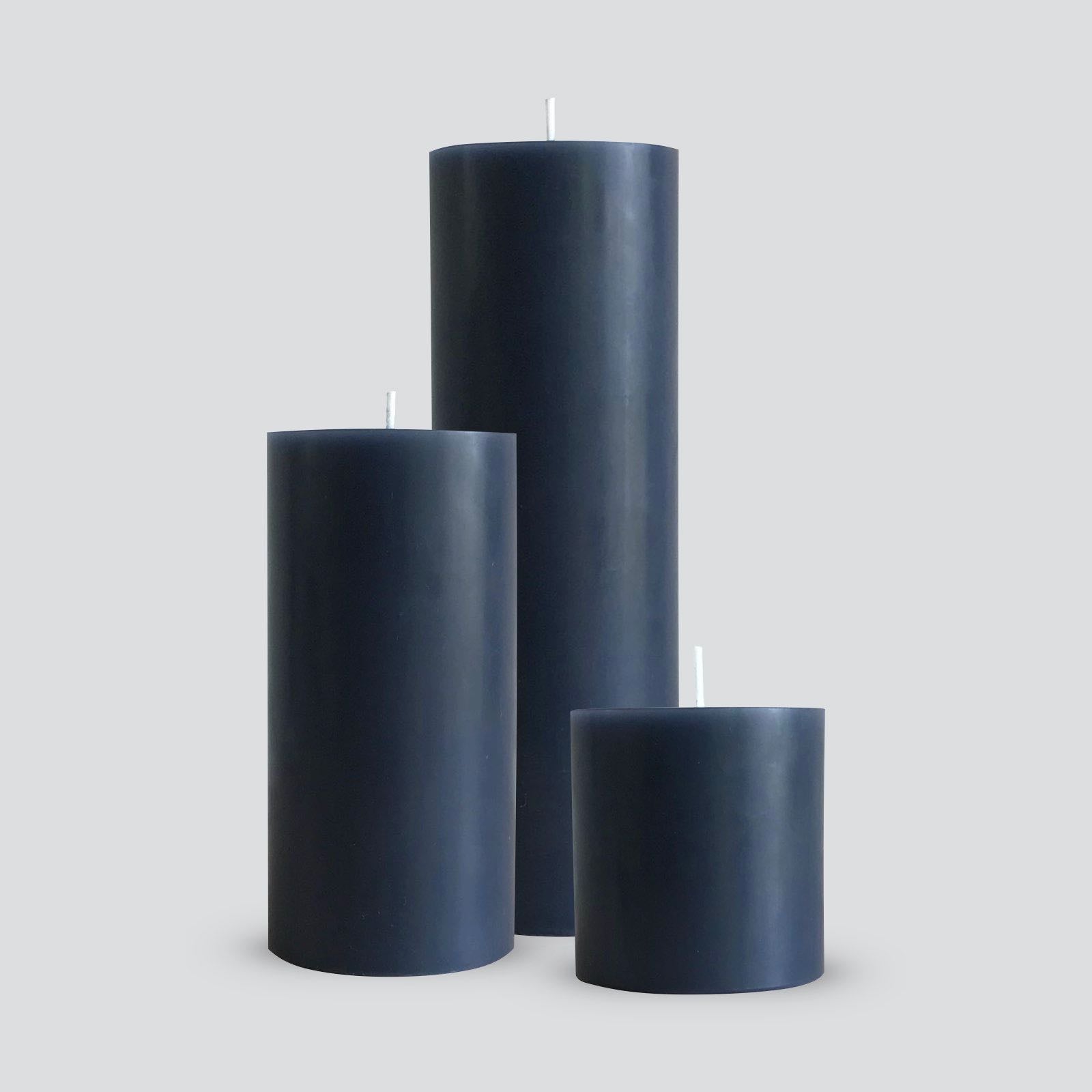 Large grey pillar candles