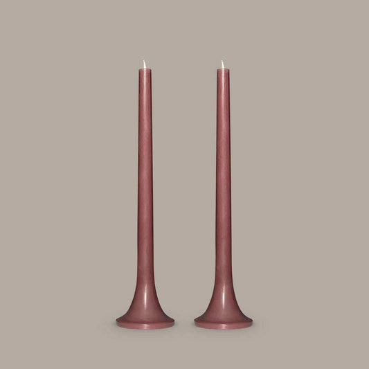 Tall taper candles in neutral brown