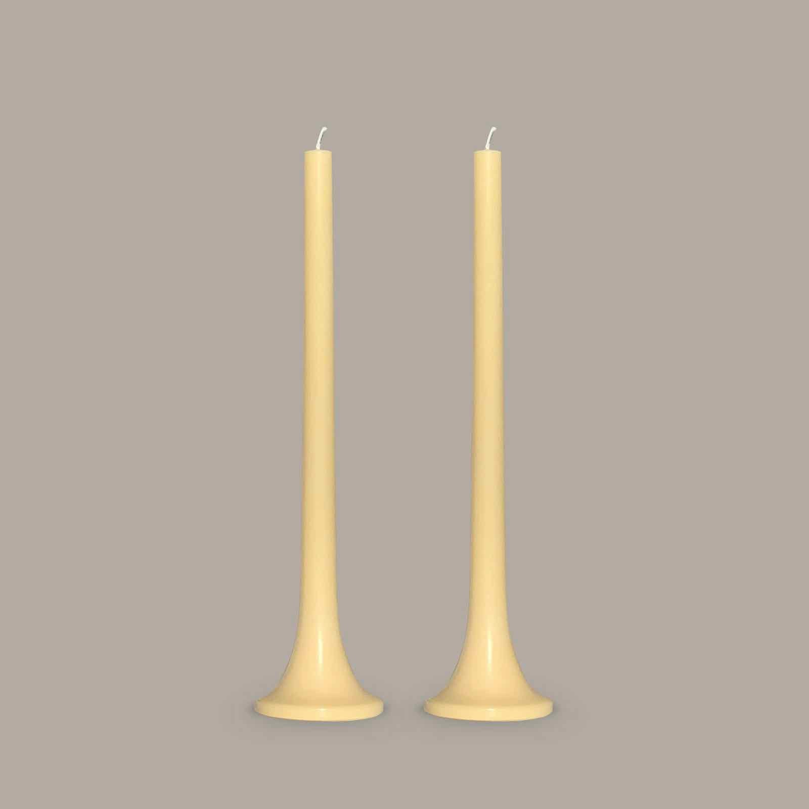 Soft yellow taper candles