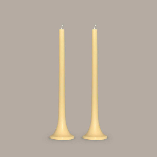 Soft yellow taper candles