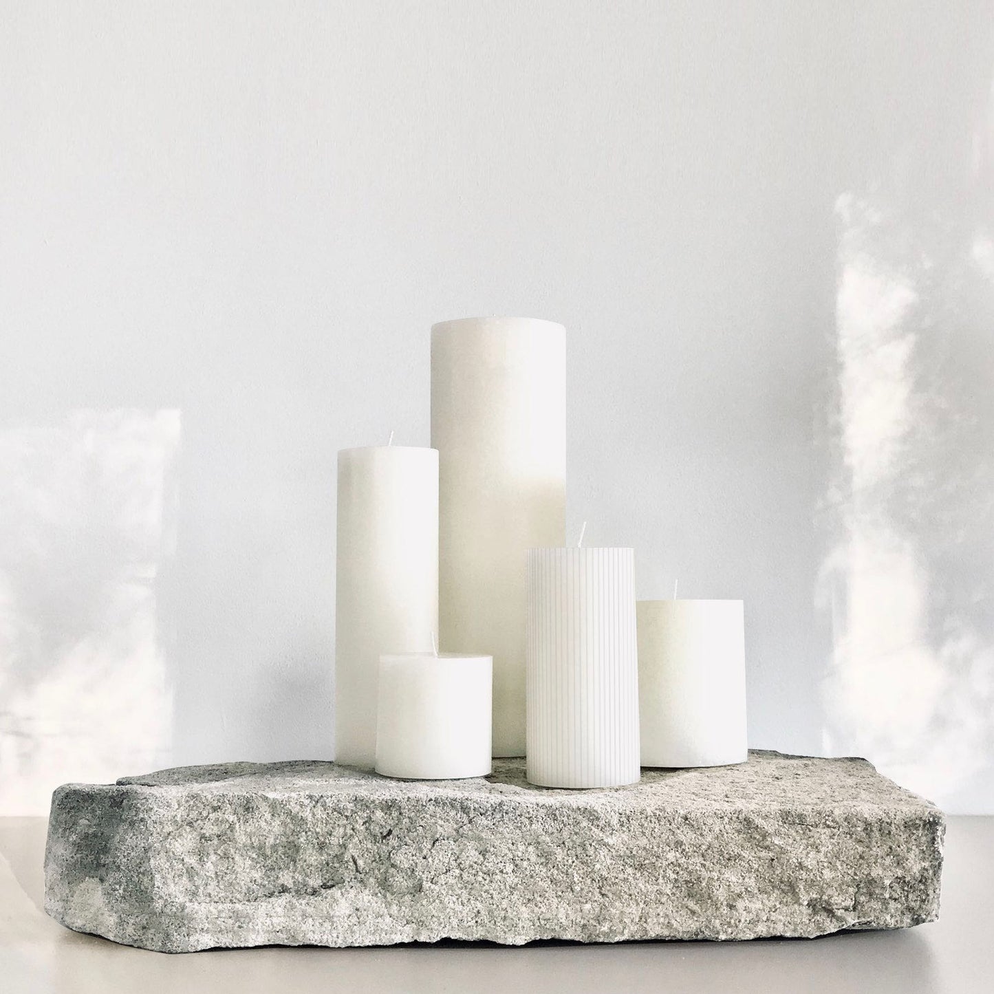 White sculptural pillar candle set