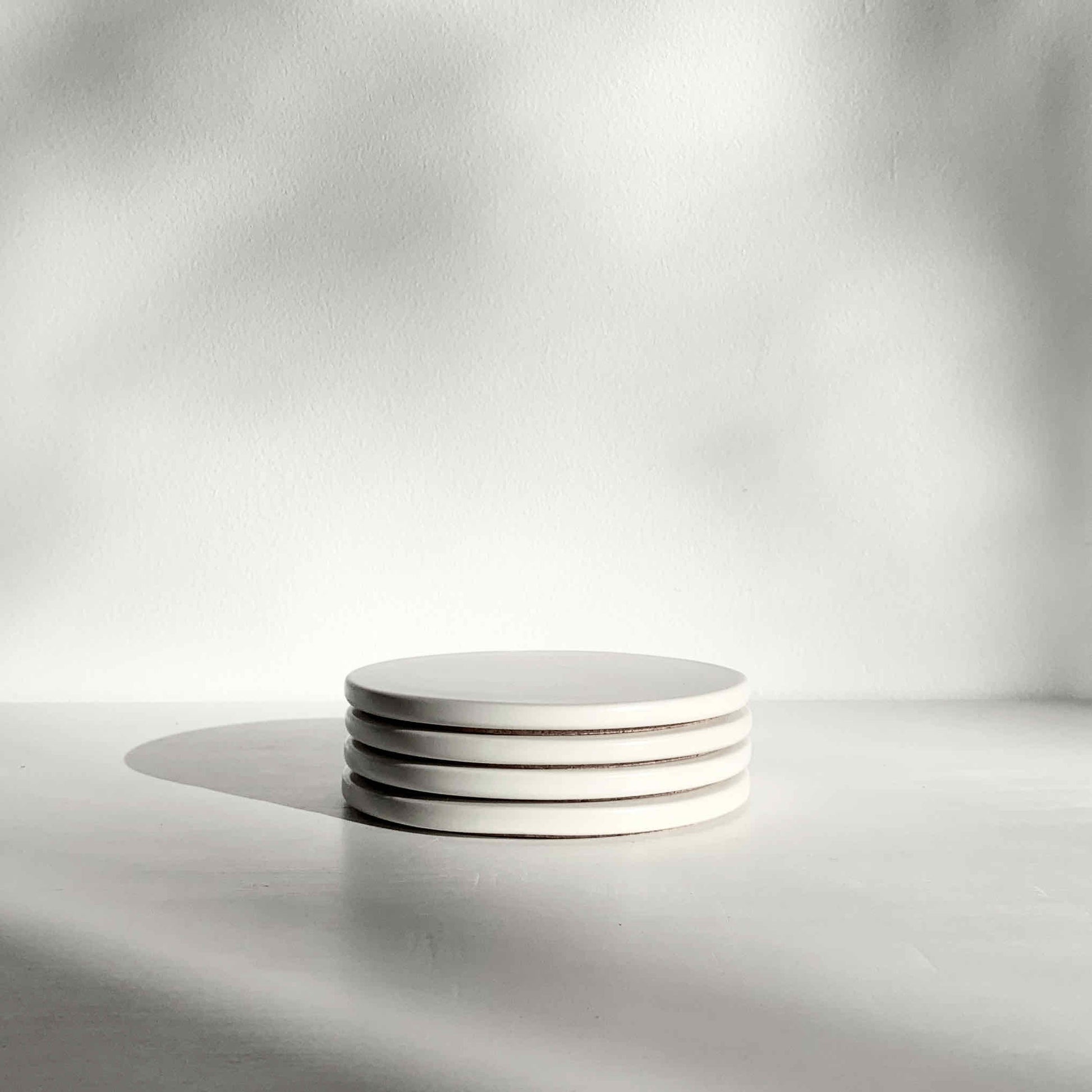 Ceramic coasters in white