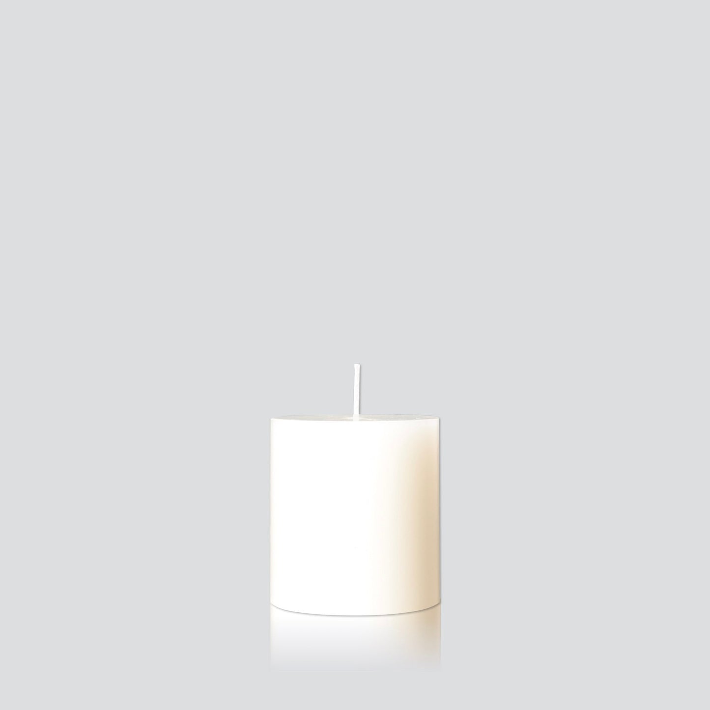Warm white small pillar candle
