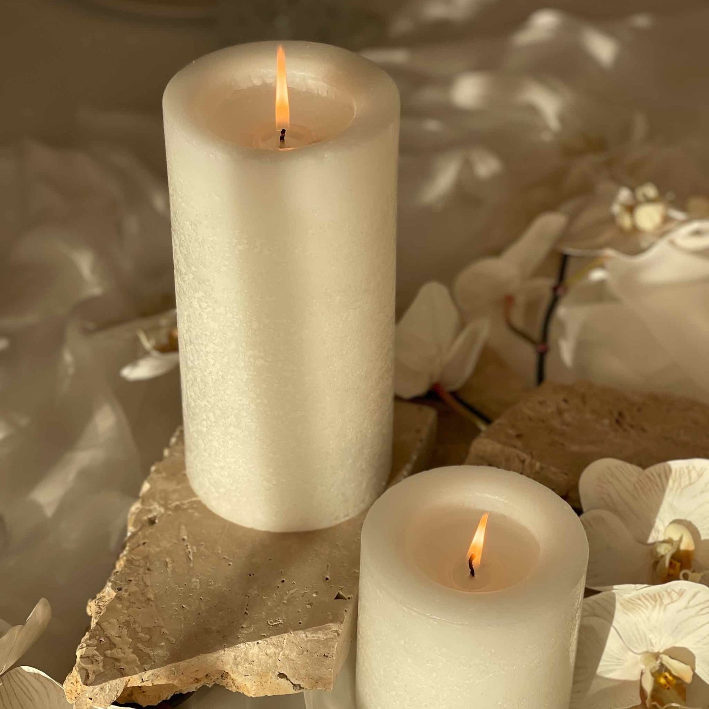 Large white pillar candles