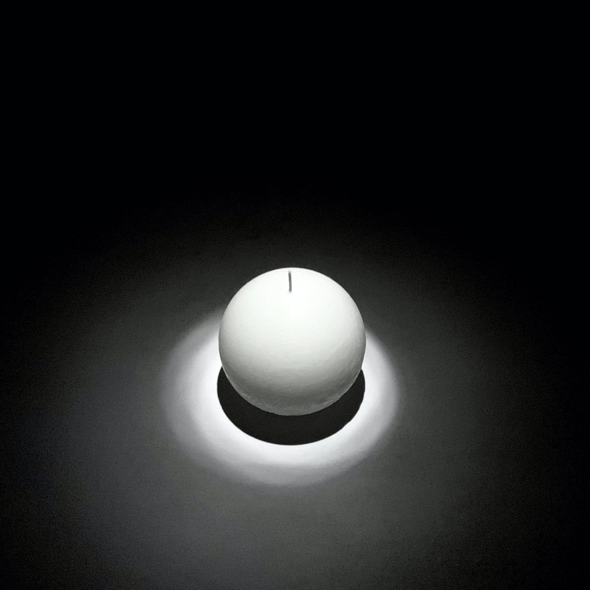 White sphere candle