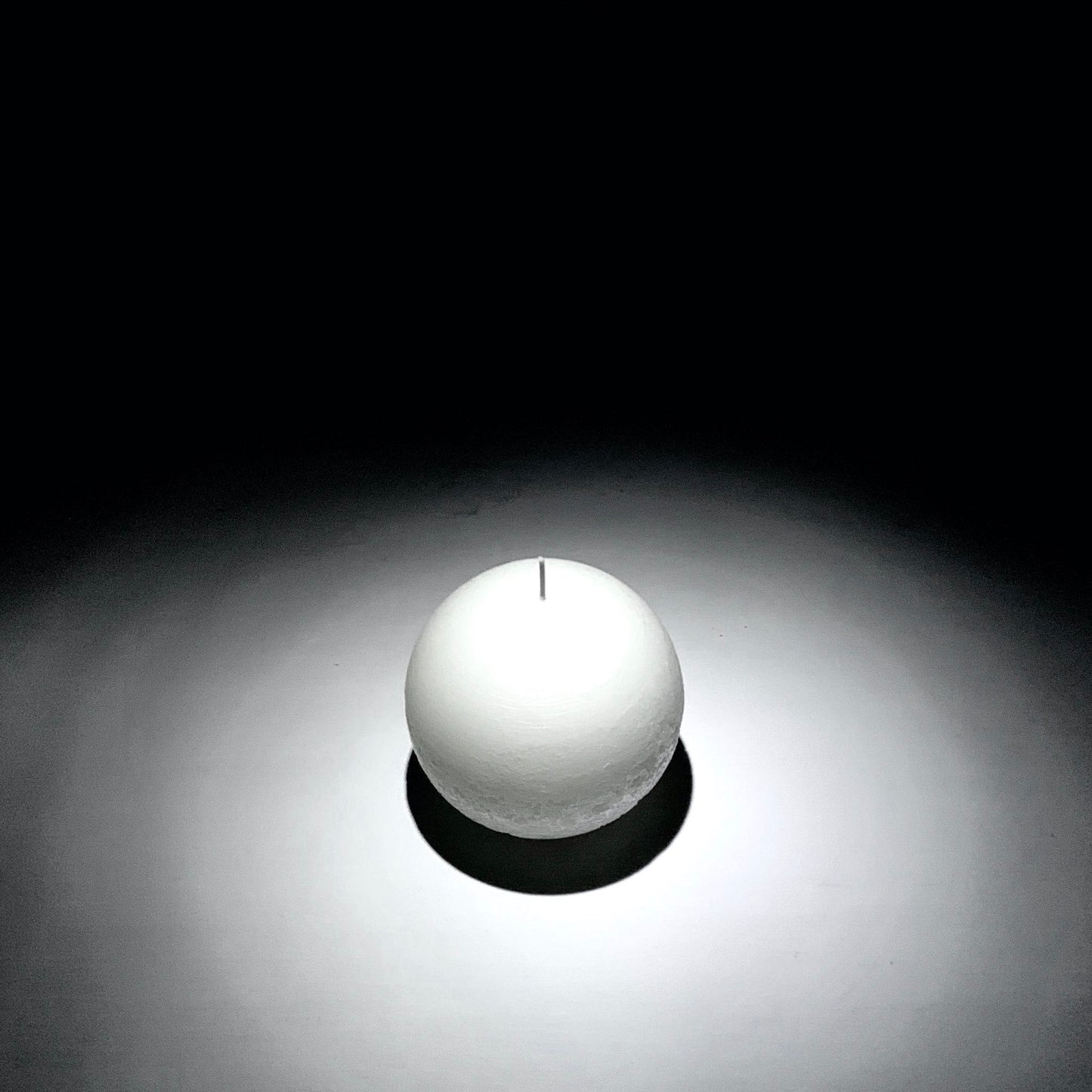 Round white sphere candle
