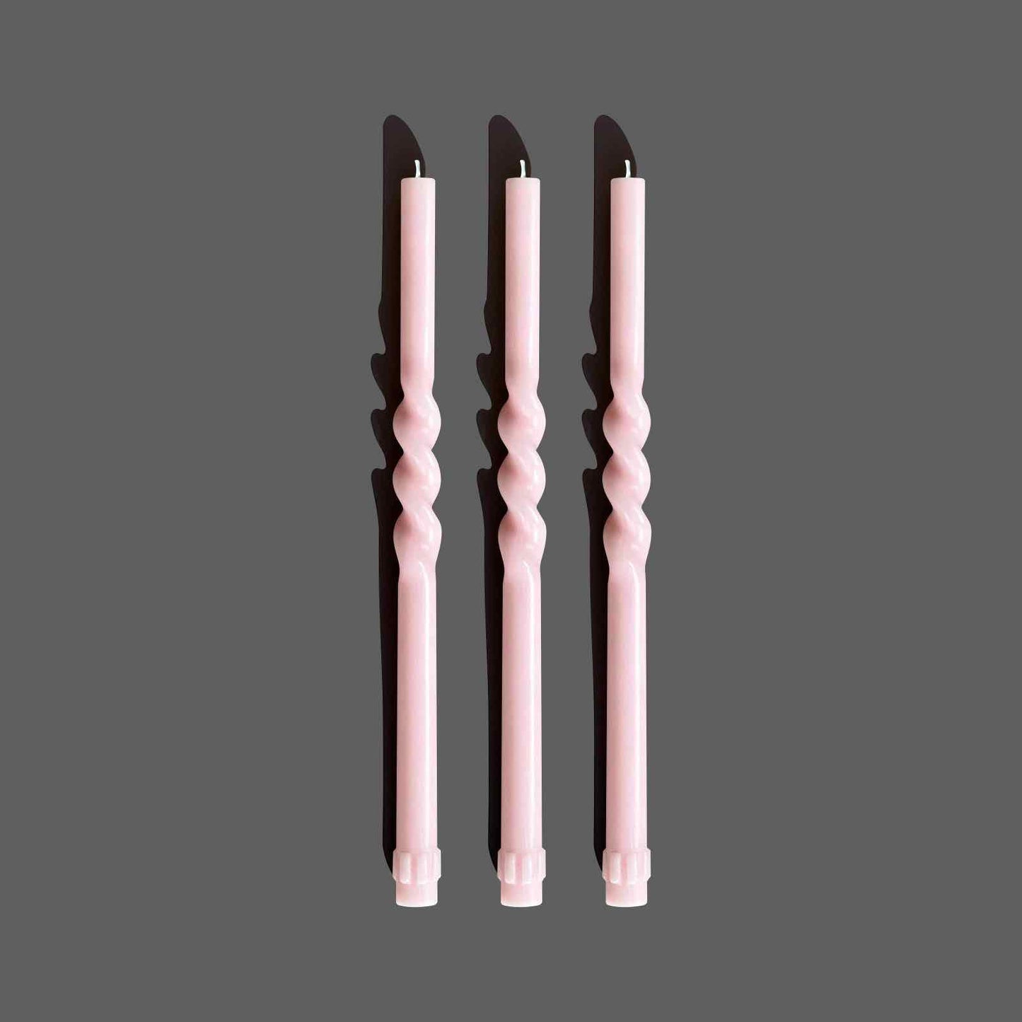Pink twisted taper candles
